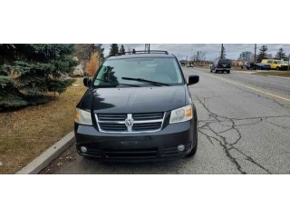 2010 DODGE G.CARAVAN SXT, STOW N GO.